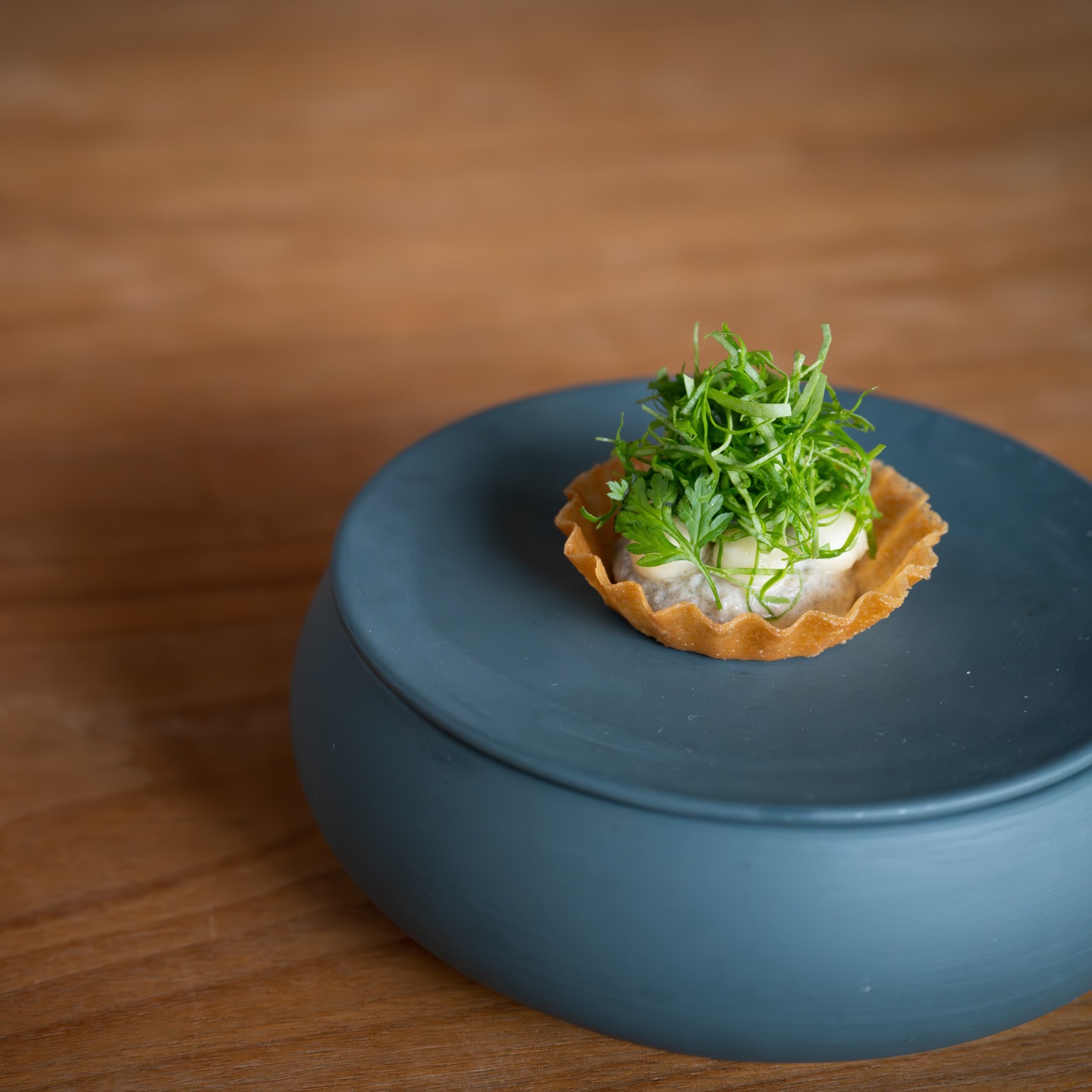 Beckon-Denver_Michelin-Mushroom-watercress-yeast Seasonal tasting menu dish featuring fresh mushrooms and watercress at Michelin-starred Beckon in Denver.